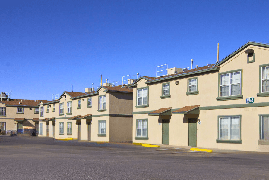 a row of houses in a parking lot